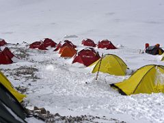01B The tents of Ak-Sai Travel Lenin Peak Camp 2 5400m are on a small rocky ledge above the glacier